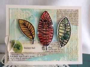 Watercolored leaves create a stunning card